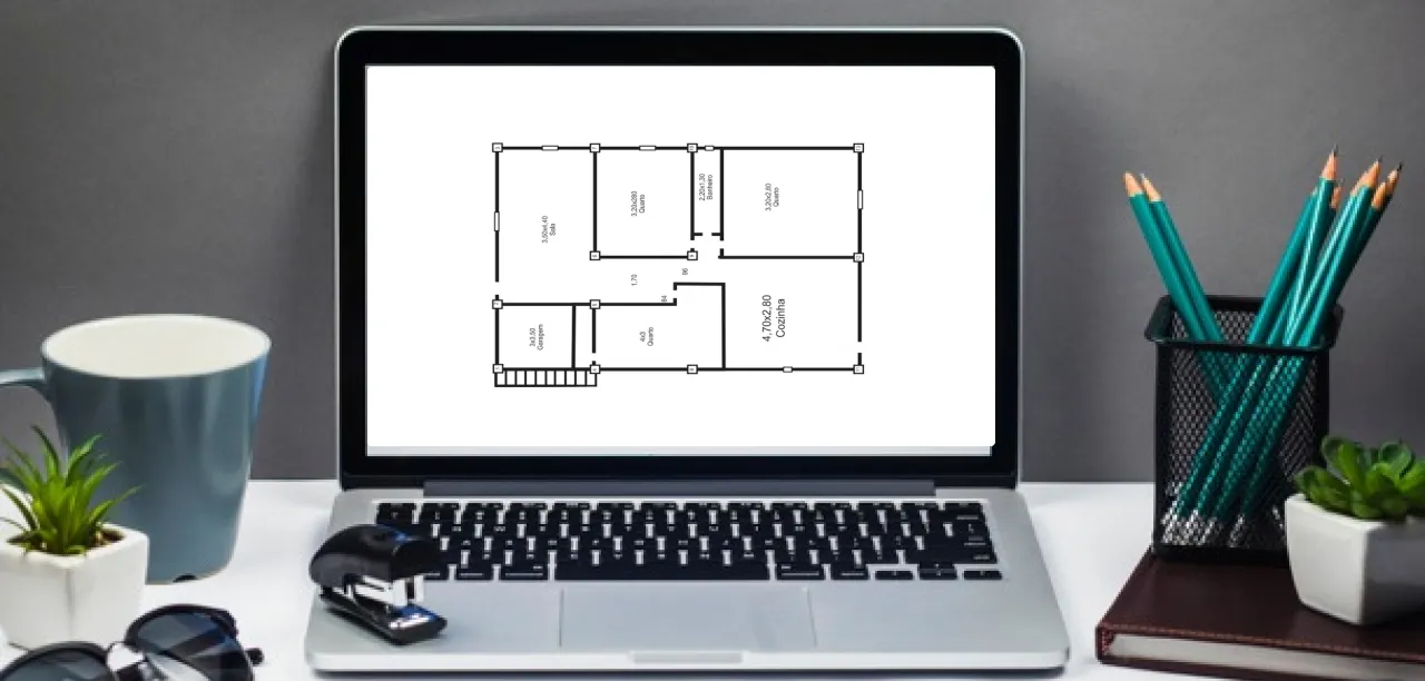 planta de casa em tela de computador decoracao Computador mostrando planta de casa para projetar a decoração de maneira eficiente.