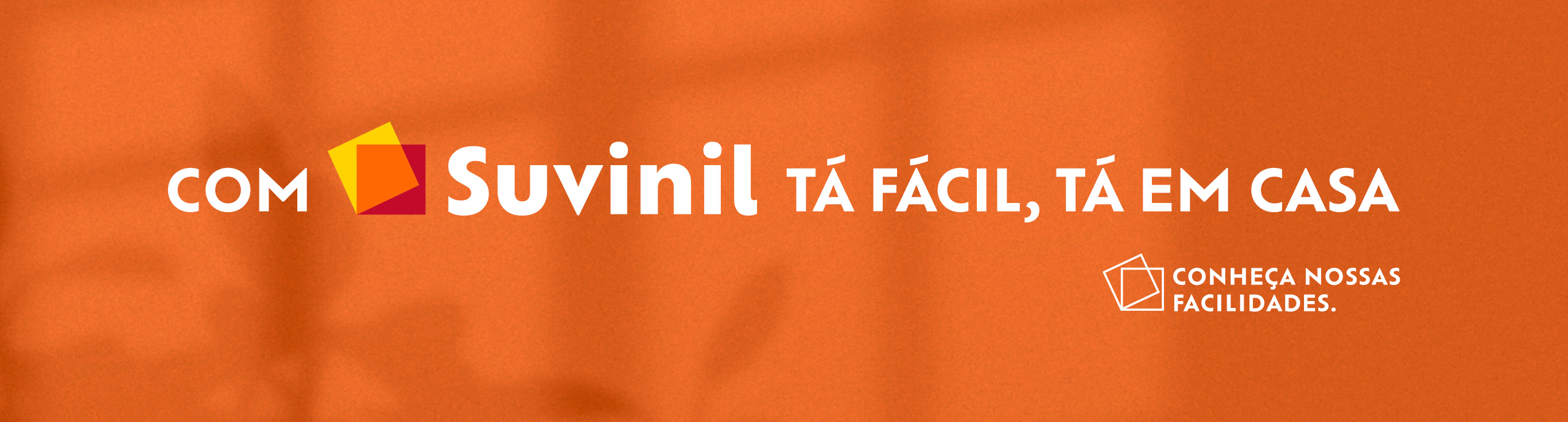 banner_a_suvinil Banner laranja escrito: Com Suvinil tá fácil, tá em casa. (Conheça nossas facilidades)
